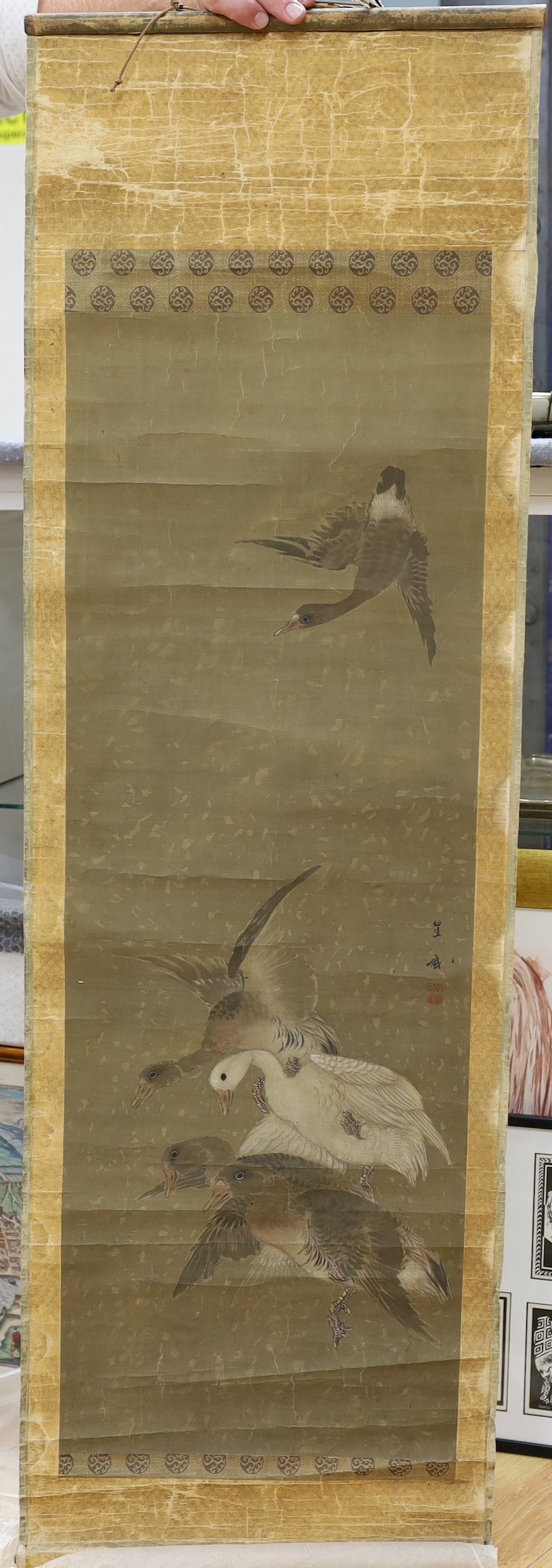 A 19th century Japanese scroll painting on silk of geese, signed, image 102 cm X 36 cm